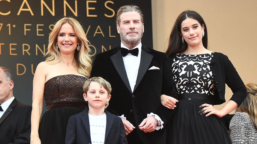 A photo of John Travolta and family