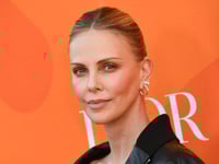 Charlize Theron takes dig at Bezos wedding while Mia Farrow celebrates his charitable ex-wife