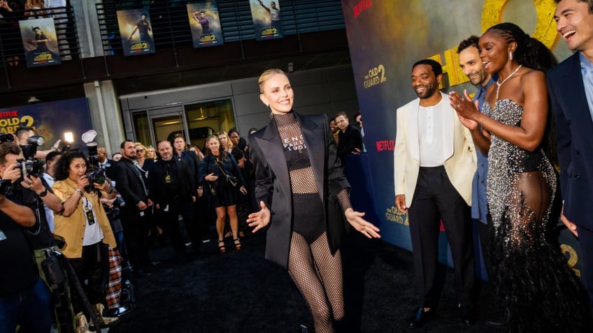 charlize theron walking red carpet