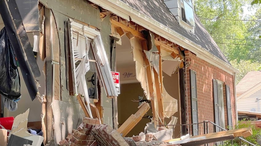 The destroyed facade of the house on Galway Drive in Charlotte where a fatal shootout took place on Monday