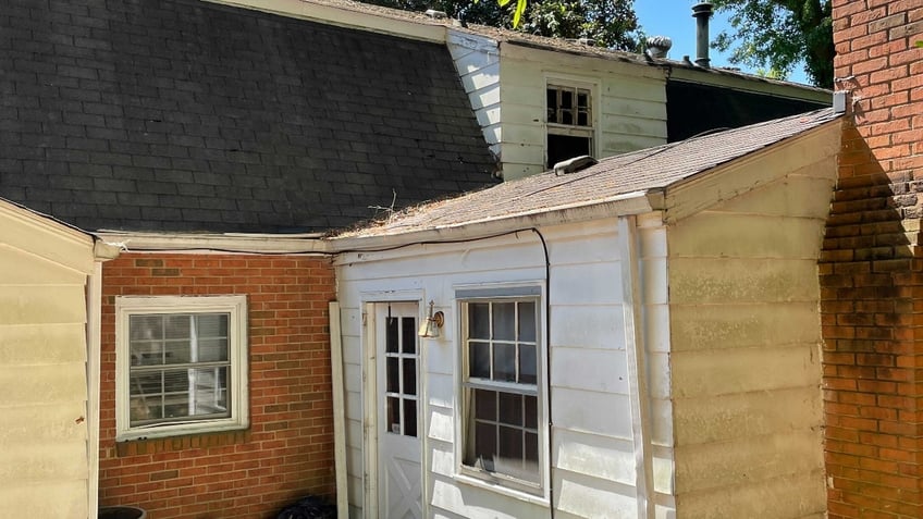 A window is blown out on the back of the house on Galway Drive in Charlotte