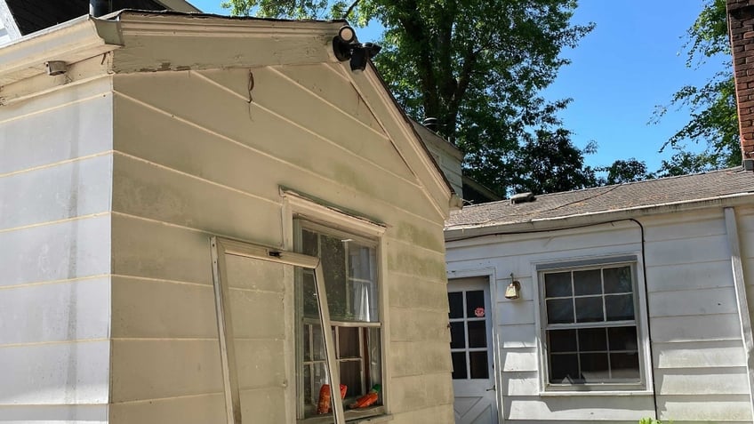 A window is blown out on the back of the house on Galway Drive in Charlotte