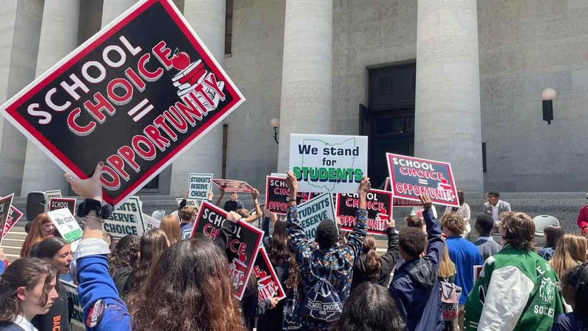 Students and parents rally at the Ohio Statehouse