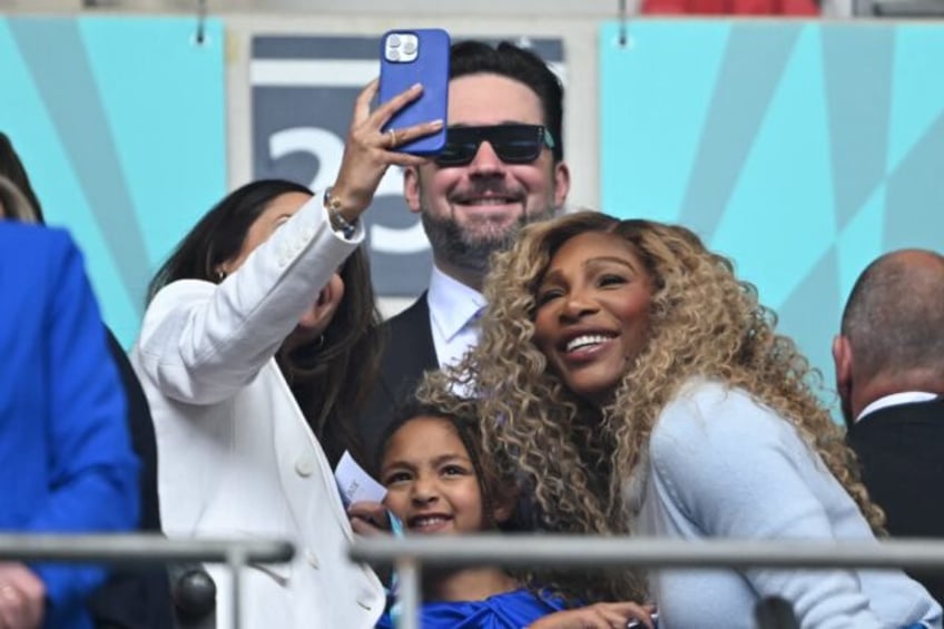 Famous fans: US tennis legend Serena WIlliams (R) poses for a selfie photograph with her d