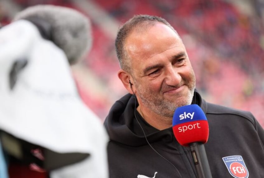 Heidenheim coach Frank Schmidt has been with the side for 17 years, taking them from the f