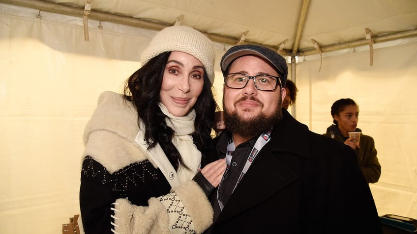 cher confesses she faced challenges with sons transition difficult for me