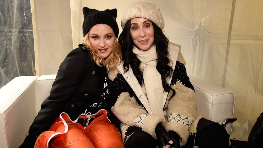 cher insists no beef with madonna despite video featured on material girls new tour