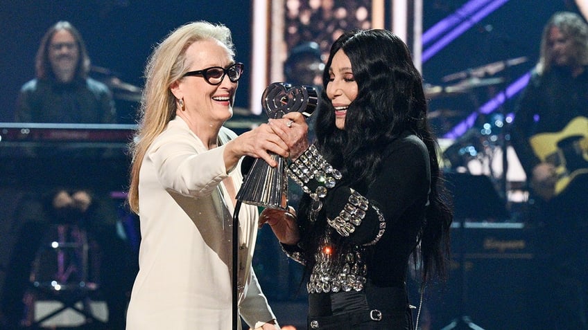 Meryl Streep and Cher on stage