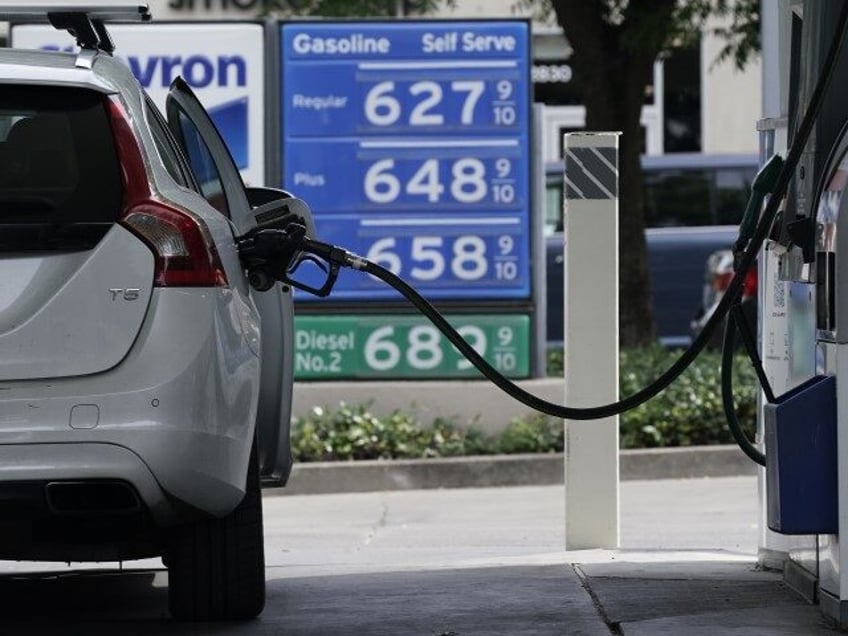 Gas prices over the $6 dollar mark are displayed at a gas station in Sacramento, Calif., F