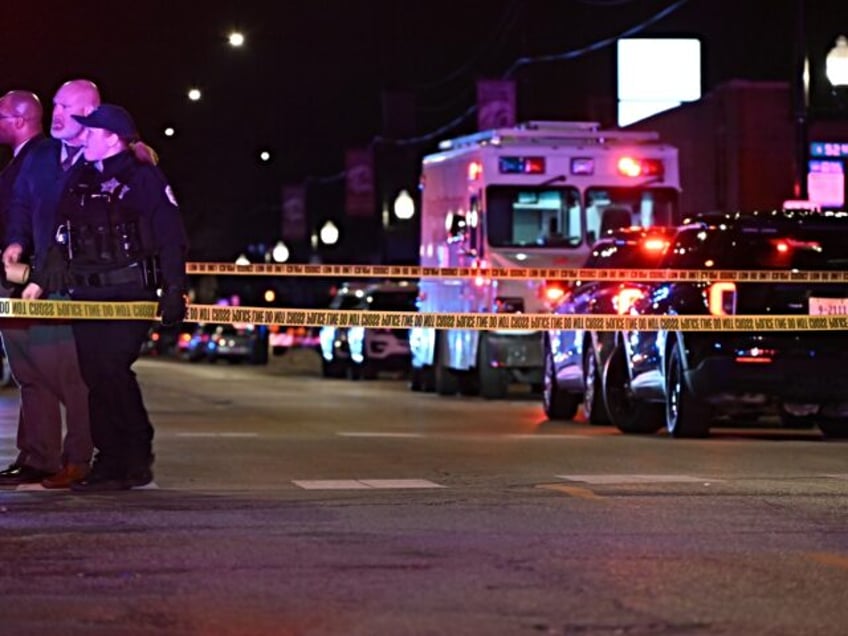 CHICAGO, ILLINOIS, UNITED STATES - APRIL 13: Police officers and officials arrive to inspe