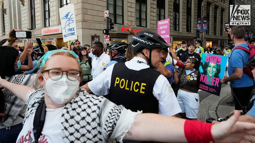 Anti-Israel protesters participate in the ‘Bodies Outside of Unjust Laws’ march ahead of the start of the Democratic National Convention