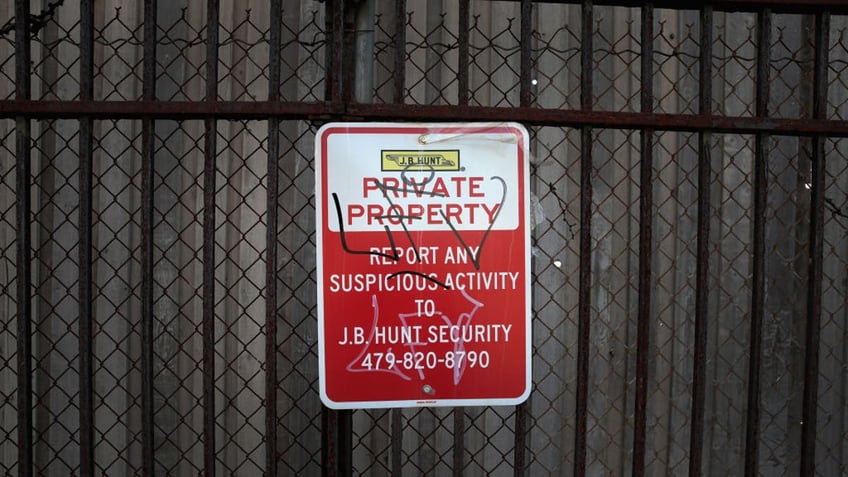 Gang graffiti is scribbled on a sign in the Lawndale neighborhood in Chicago. (Scott Olson/Getty Images)