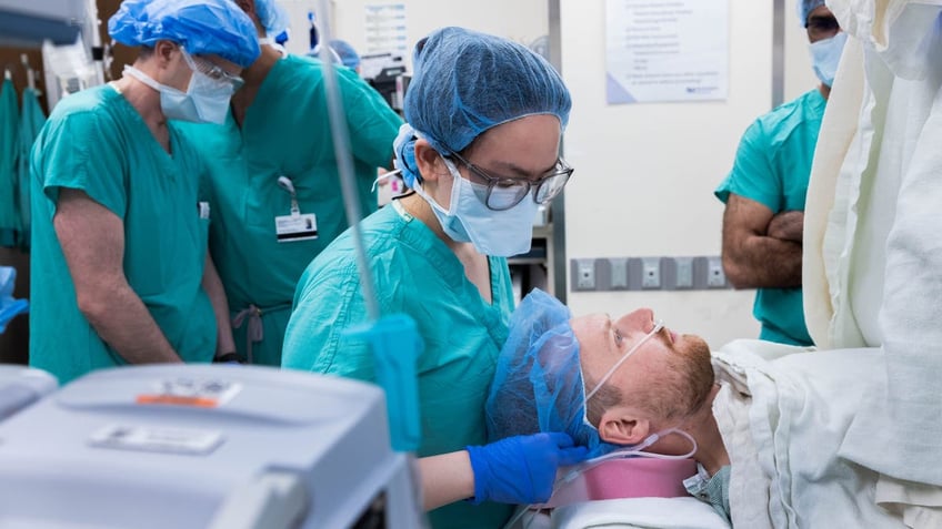 John Nicholas during surgery