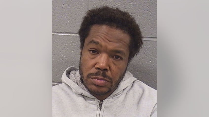 chicago murder suspect repeatedly arrested released before bank execs death