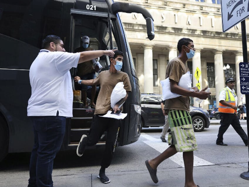 chicago residents gather to oppose new migrant shelter at lake shore hotel