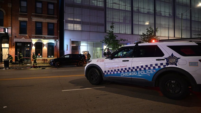 Chicago police cruiser outside scene of shooting