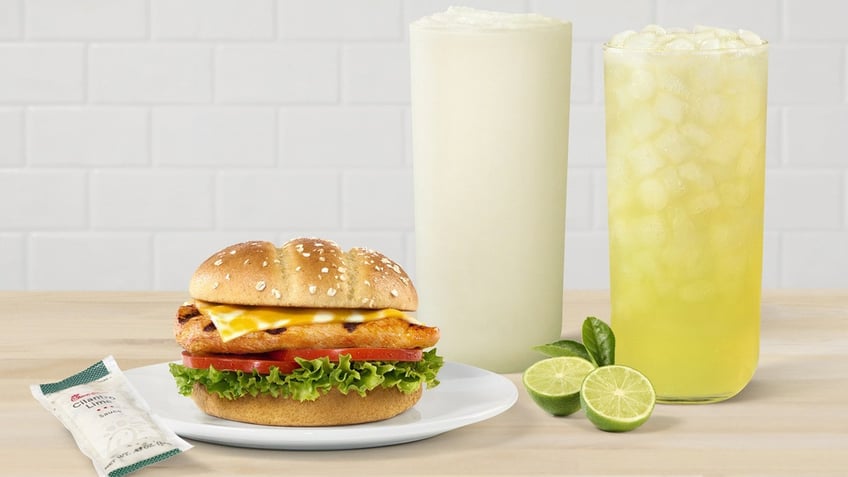 Chick-fil-A's Grilled Spicy Deluxe Sandwich, Key Lime Frosted Lemonade and Key Lime Lemonade are shown.