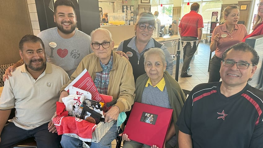 Bill and Becky Chilcutt with Chick-fil-A employees