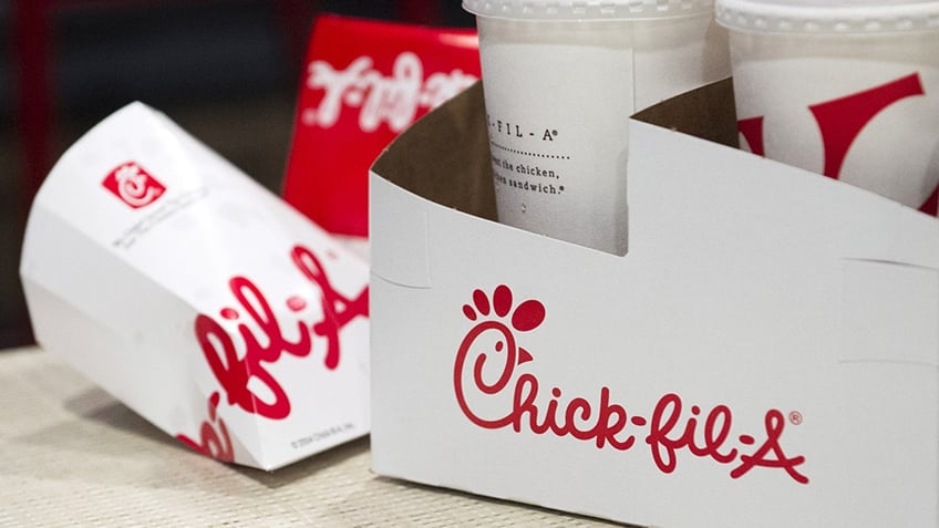 Drink and sandwich containers are seen on a customer's table during the grand opening of a Chick-fil-A freestanding franchise restaurant in Midtown, New York October 3, 2015. REUTERS/Rashid Umar Abbasi - GF10000231056