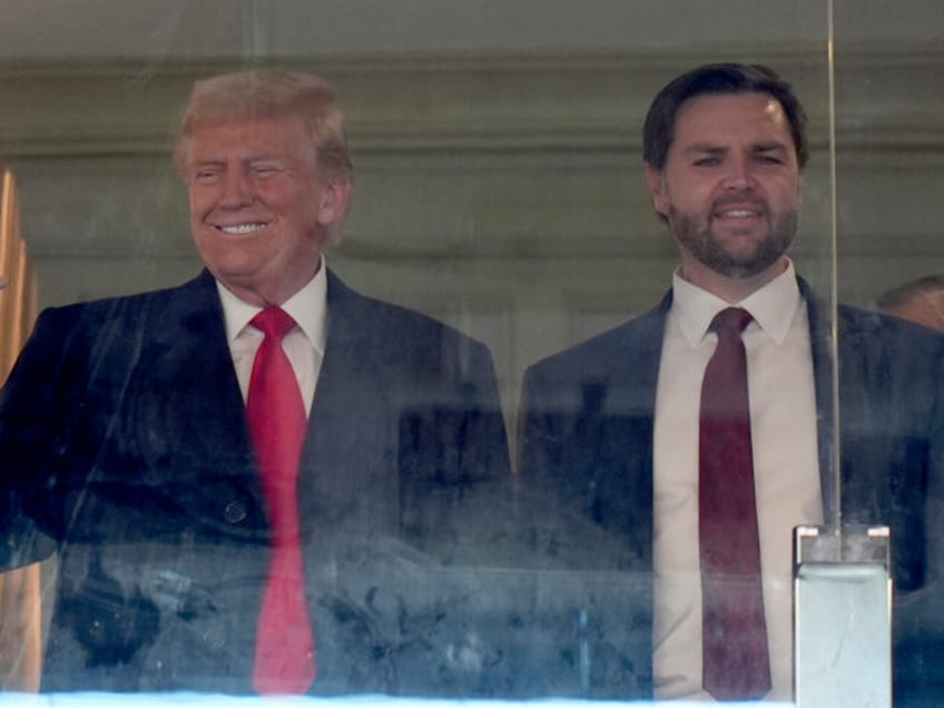 President-elect Donald Trump, left, and Vice President-elect JD Vance attend the NCAA coll