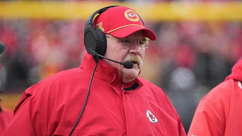 Andy Reid looks on