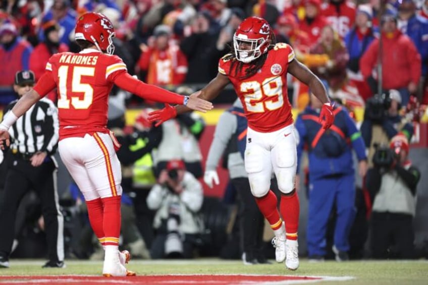 Kareem Hunt of the Kansas City Chiefs celebrates his touchdown run with quarterback Patric