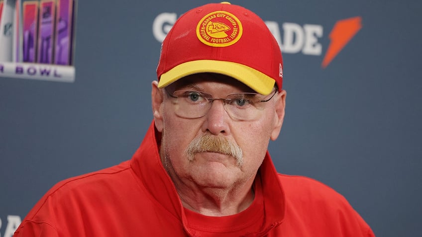 Andy Reid talks to reporters