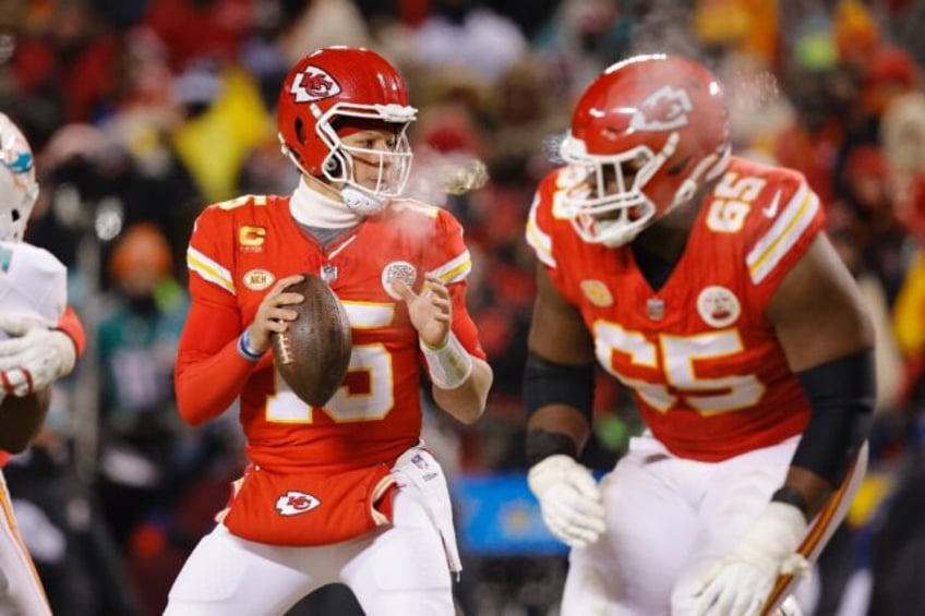 Kansas City quarterback Patrick Mahomes looks to pass in the first half of the Chiefs' NFL playoff win over the Miami Dolphins