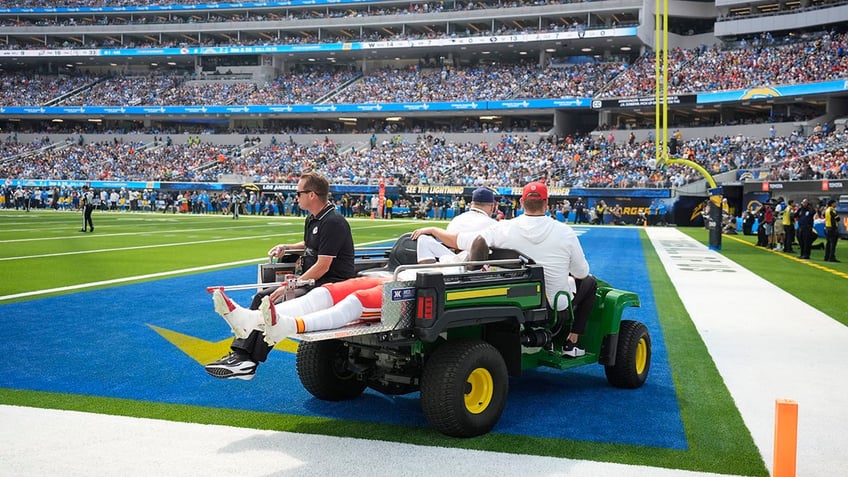 Rashee Rice taken off field on cart