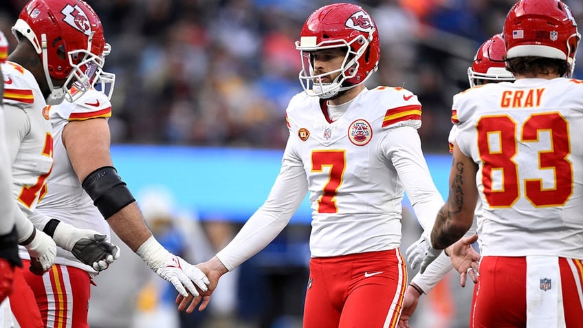 Harrison Butker shakes hands