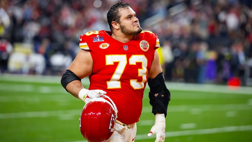 Nick Allegretti walks off the field