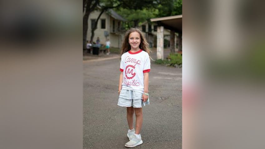 Janie Hunt in a Camp Mystic shirt