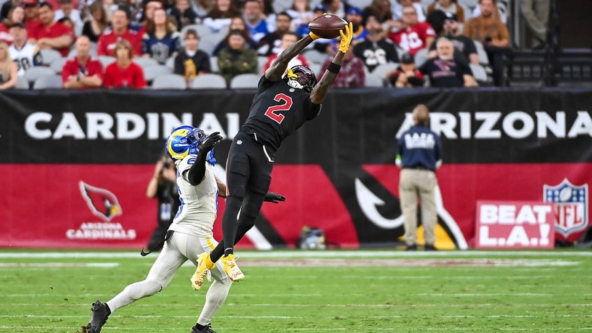 Marquise Brown catches a pass in the air