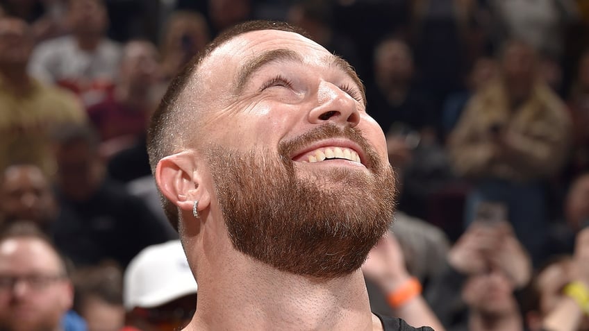 travis kelce smiles at game 