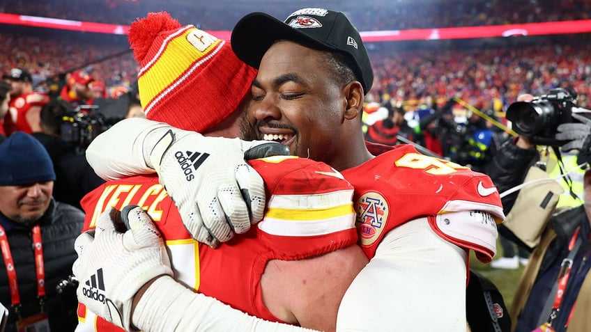 Chris Jones embraces Travis Kelce