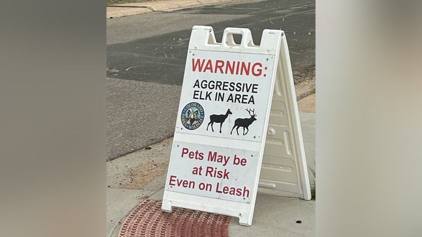 Sign at Colorado park warning of aggressive cow elks.