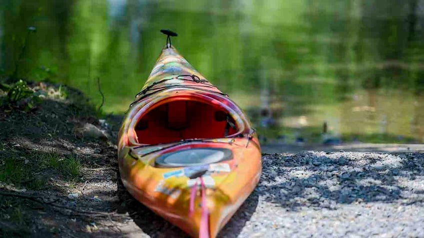 empty kayak on shore