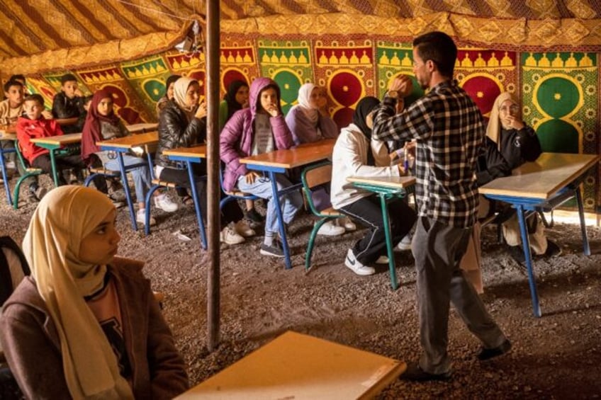 children trek to tent school in quake hit morocco