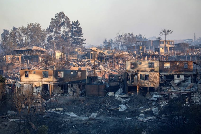 chile arrests two for potential arson as fires kill 112 and keep burning