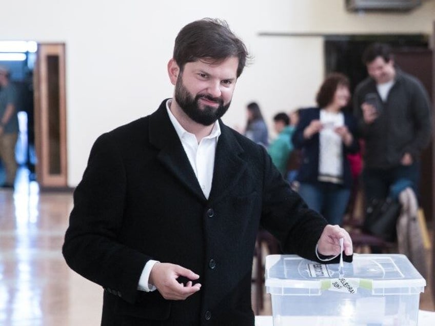 Chile's President Gabriel Boric votes on the draft of a new constitution in Punta Arenas, Chile, Sunday, Dec. 17, 2023. For the second time in as many years, Chileans vote in a referendum on whether to replace the current constitution which dates back to the military dictatorship of Gen. Augusto …