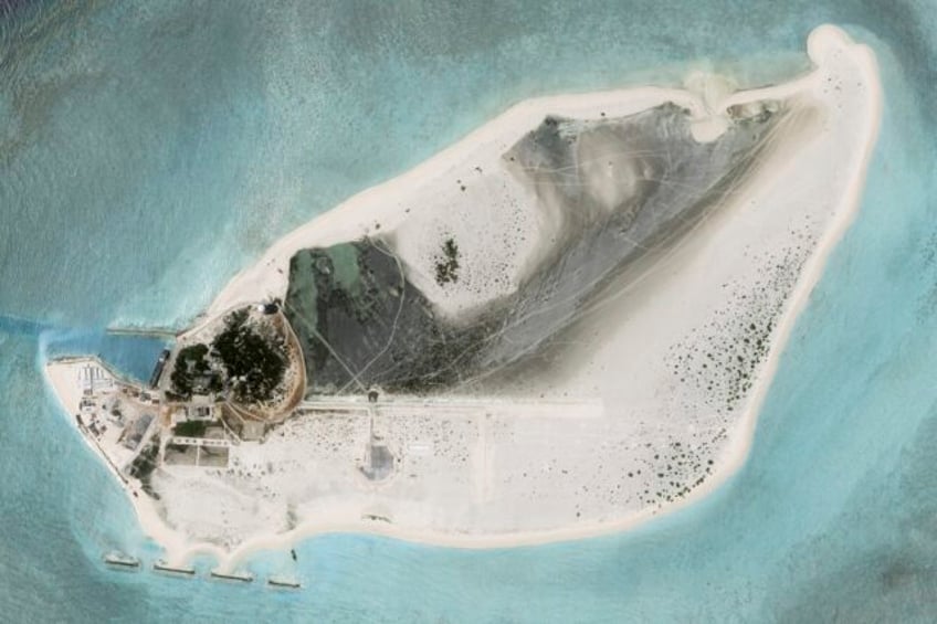 china appears to be building an airstrip on a disputed south china sea island