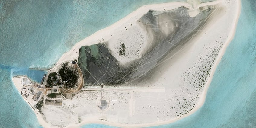 china appears to be constructing airstrip on disputed south china sea island that is also claimed by taiwan