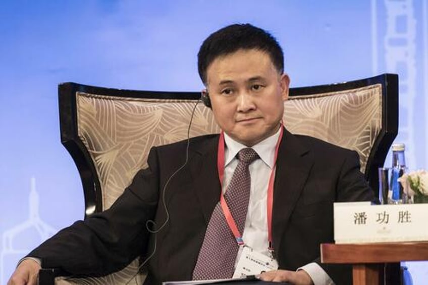 china appoints new central bank governor in latest bid to revive slumping economy