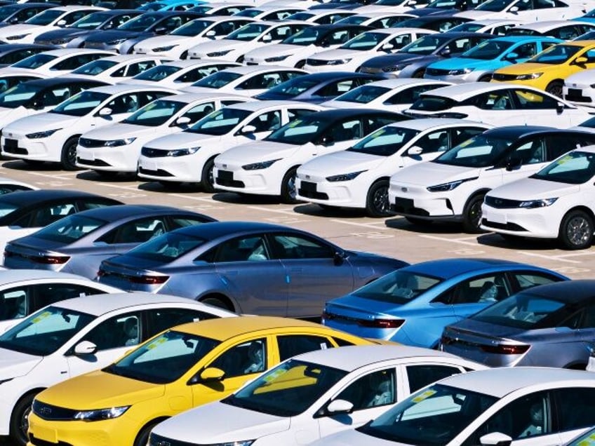 JINZHONG, CHINA - SEPTEMBER 07: Aerial view of new electric cars sitting parked at a parking lot of Geely's Jinzhong manufacturing facility on September 7, 2022 in Jinzhong, Shanxi Province of China. (Photo by VCG/VCG via Getty Images)