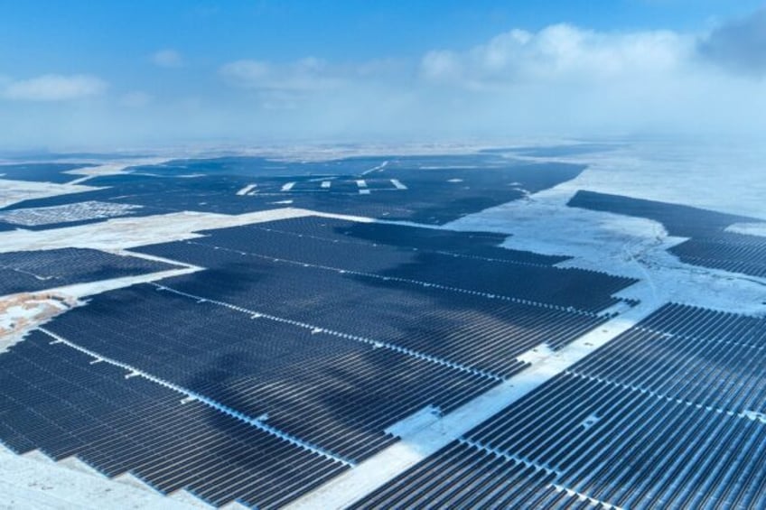 Solar panels in the Gobi desert in north China. China has twice as much wind and solar ene