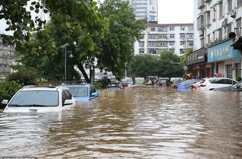 china busy hiding reports of flood damage and death