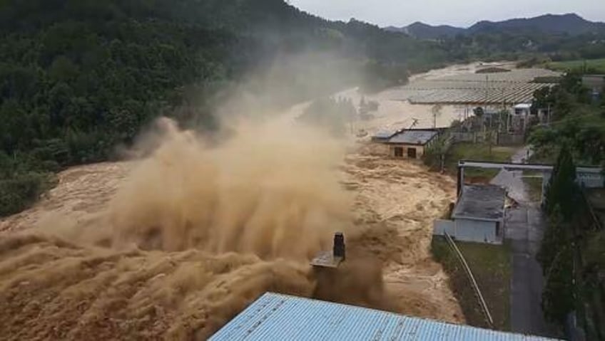 china busy hiding reports of flood damage and death