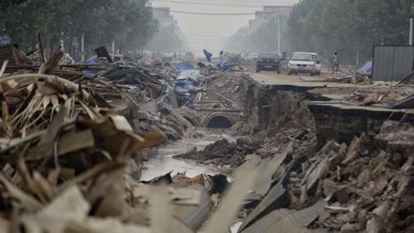 china busy hiding reports of flood damage and death