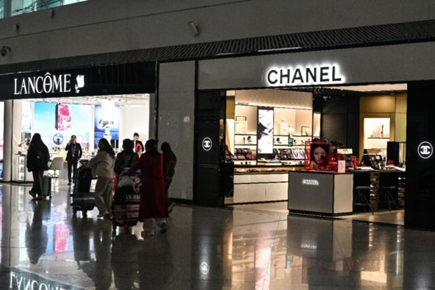 Shops at the Jiangbei international airport in southwestern China. Domestic consumption is