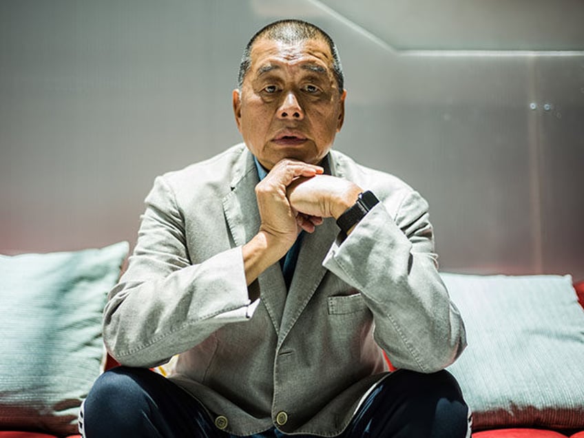 In this picture taken on June 16, 2020, millionaire media tycoon Jimmy Lai, 72, poses during an interview with AFP at the Next Digital offices in Hong Kong. - Lai knows his support for Hong Kong's pro-democracy protests could soon land him behind bars, but the proudly self-described "troublemaker" says …